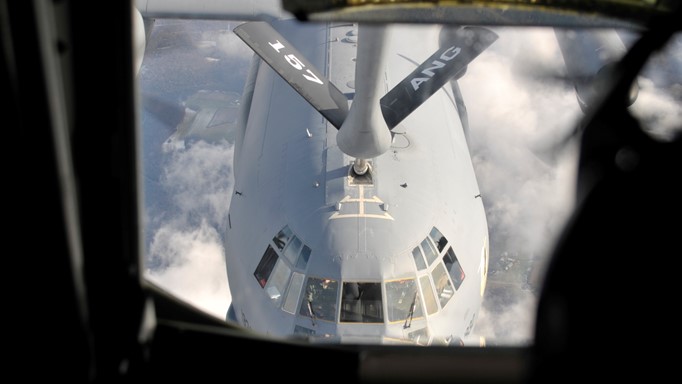 Image of U.S. Air Force C-17 being refueled by a KC-135 air refueling tanker